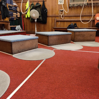 Carpet, mats and boxes at Exeter Cathedral